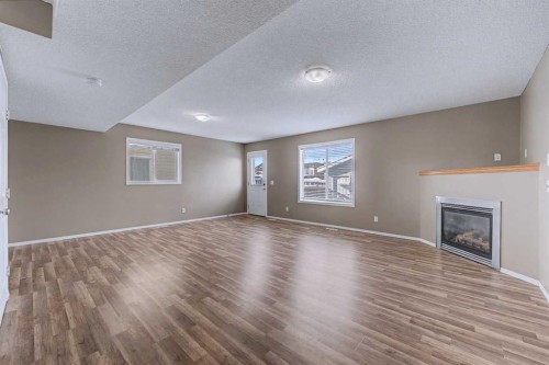522 Evermeadow Road Sw, Calgary, AB - Indoor With Fireplace
