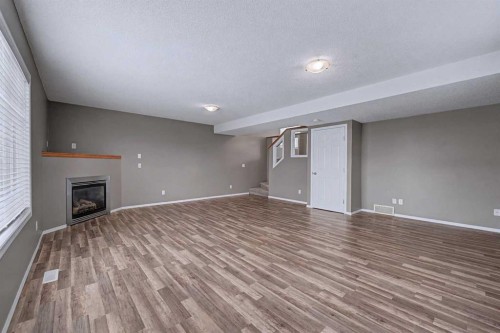 522 Evermeadow Road Sw, Calgary, AB - Indoor With Fireplace