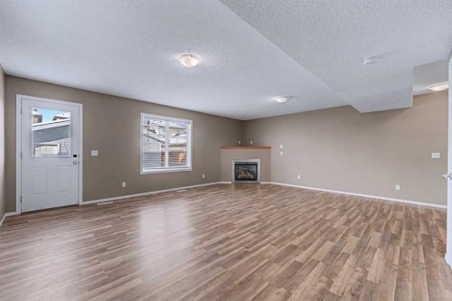 522 Evermeadow Road Sw, Calgary, AB - Indoor With Fireplace