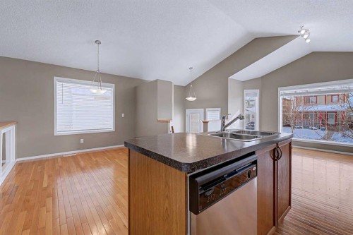 522 Evermeadow Road Sw, Calgary, AB - Indoor Photo Showing Kitchen With Double Sink