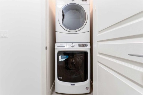 602-1320 1 Street Se, Calgary, AB - Indoor Photo Showing Laundry Room