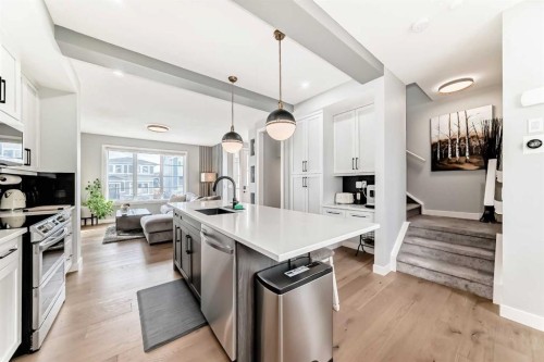 29 Precedence Glen, Cochrane, AB - Indoor Photo Showing Kitchen With Upgraded Kitchen