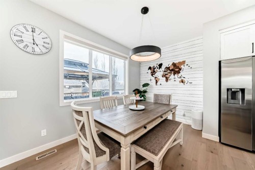 29 Precedence Glen, Cochrane, AB - Indoor Photo Showing Dining Room