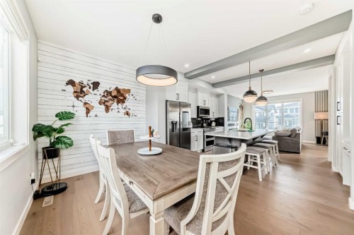 29 Precedence Glen, Cochrane, AB - Indoor Photo Showing Dining Room