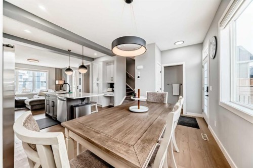 29 Precedence Glen, Cochrane, AB - Indoor Photo Showing Dining Room