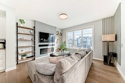 29 Precedence Glen, Cochrane, AB - Indoor Photo Showing Living Room