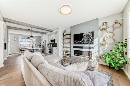 29 Precedence Glen, Cochrane, AB - Indoor Photo Showing Living Room