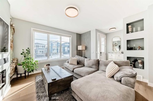 29 Precedence Glen, Cochrane, AB - Indoor Photo Showing Living Room