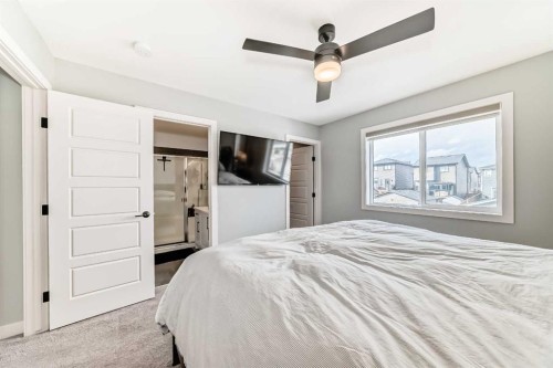 29 Precedence Glen, Cochrane, AB - Indoor Photo Showing Bedroom