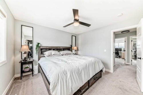 29 Precedence Glen, Cochrane, AB - Indoor Photo Showing Bedroom
