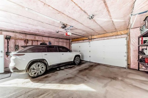 29 Precedence Glen, Cochrane, AB - Indoor Photo Showing Garage