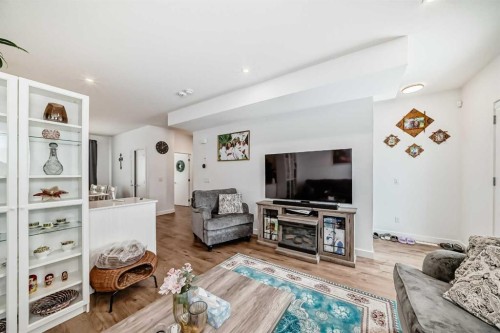 604-280 Chelsea Road, Chestermere, AB - Indoor Photo Showing Living Room