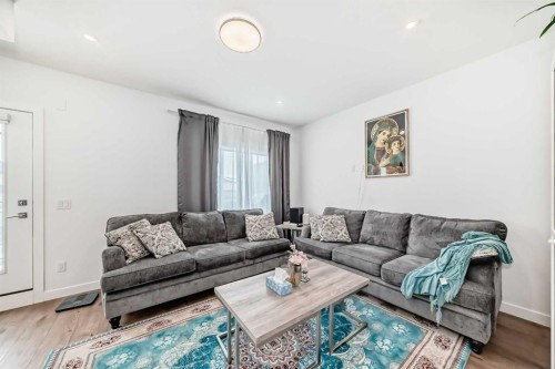 604-280 Chelsea Road, Chestermere, AB - Indoor Photo Showing Living Room