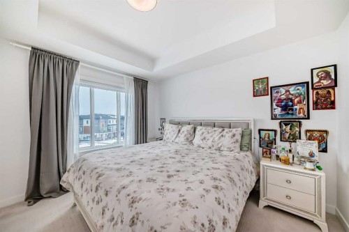 604-280 Chelsea Road, Chestermere, AB - Indoor Photo Showing Bedroom