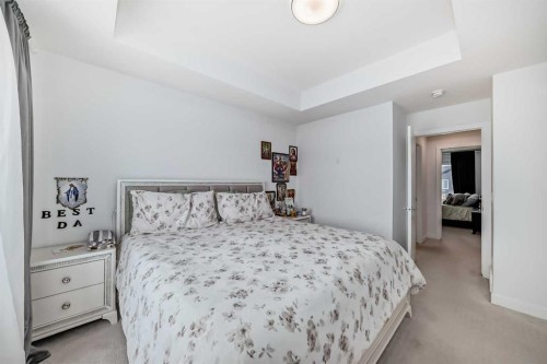 604-280 Chelsea Road, Chestermere, AB - Indoor Photo Showing Bedroom