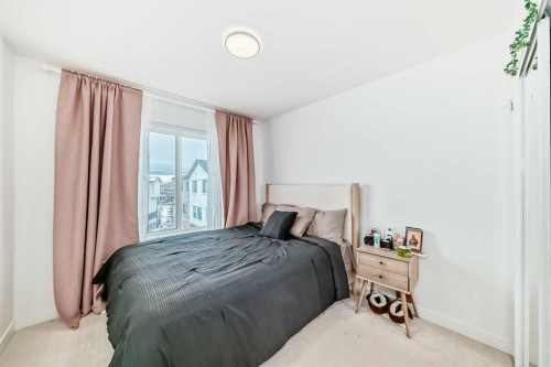604-280 Chelsea Road, Chestermere, AB - Indoor Photo Showing Bedroom