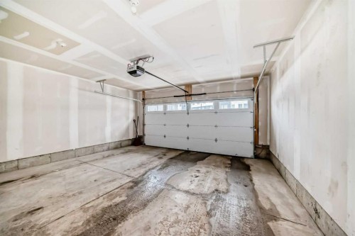 604-280 Chelsea Road, Chestermere, AB - Indoor Photo Showing Garage