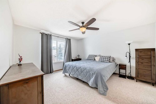 199 Mt Brewster Circle Se, Calgary, AB - Indoor Photo Showing Bedroom
