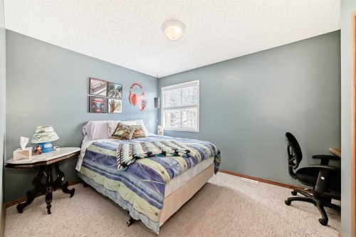 199 Mt Brewster Circle Se, Calgary, AB - Indoor Photo Showing Bedroom