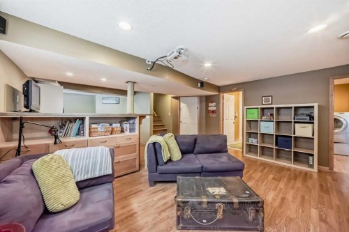 199 Mt Brewster Circle Se, Calgary, AB - Indoor Photo Showing Living Room