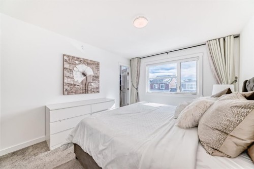 81 Herron Mews Ne, Calgary, AB - Indoor Photo Showing Bedroom