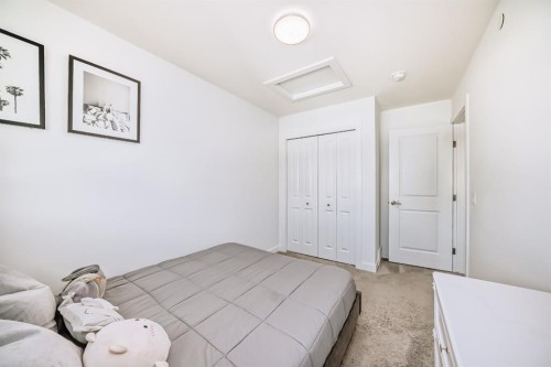 81 Herron Mews Ne, Calgary, AB - Indoor Photo Showing Bedroom
