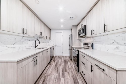 81 Herron Mews Ne, Calgary, AB - Indoor Photo Showing Kitchen With Upgraded Kitchen