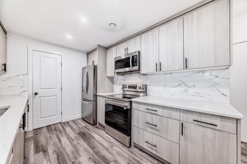 81 Herron Mews Ne, Calgary, AB - Indoor Photo Showing Kitchen