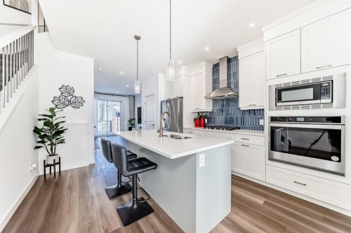 81 Herron Mews Ne, Calgary, AB - Indoor Photo Showing Kitchen With Double Sink With Upgraded Kitchen