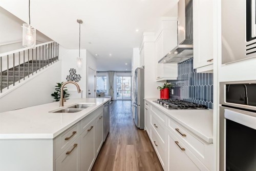 81 Herron Mews Ne, Calgary, AB - Indoor Photo Showing Kitchen With Double Sink With Upgraded Kitchen