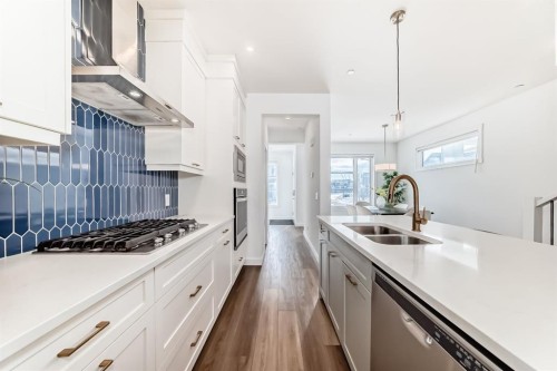 81 Herron Mews Ne, Calgary, AB - Indoor Photo Showing Kitchen With Double Sink With Upgraded Kitchen