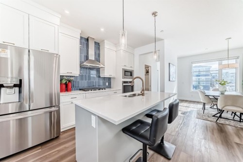 81 Herron Mews Ne, Calgary, AB - Indoor Photo Showing Kitchen With Double Sink With Upgraded Kitchen