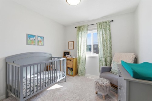 359 Fireside Way, Cochrane, AB - Indoor Photo Showing Bedroom