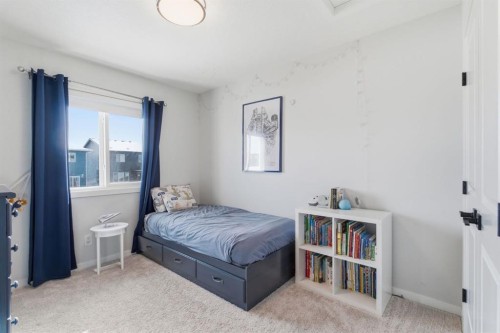 359 Fireside Way, Cochrane, AB - Indoor Photo Showing Bedroom