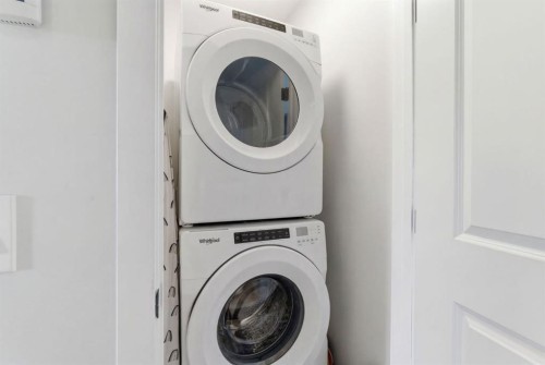 359 Fireside Way, Cochrane, AB - Indoor Photo Showing Laundry Room