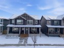359 Fireside Way, Cochrane, AB  - Outdoor With Deck Patio Veranda With Facade 