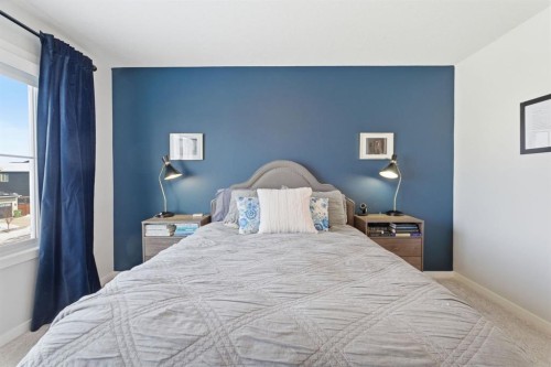 359 Fireside Way, Cochrane, AB - Indoor Photo Showing Bedroom