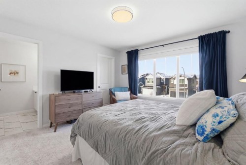 359 Fireside Way, Cochrane, AB - Indoor Photo Showing Bedroom