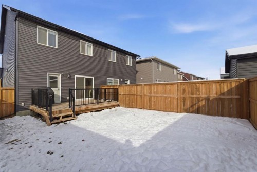 359 Fireside Way, Cochrane, AB - Outdoor With Deck Patio Veranda With Exterior