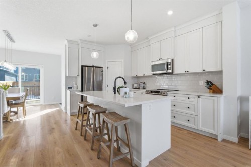 359 Fireside Way, Cochrane, AB - Indoor Photo Showing Kitchen With Upgraded Kitchen