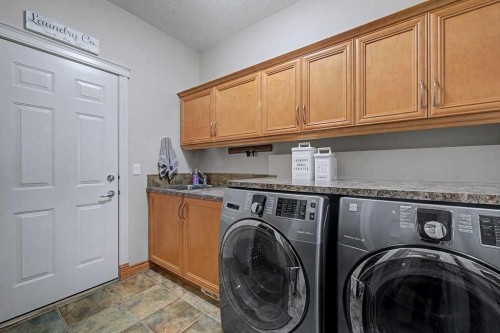 151 Arbour Vista Road Nw, Calgary, AB - Indoor Photo Showing Laundry Room