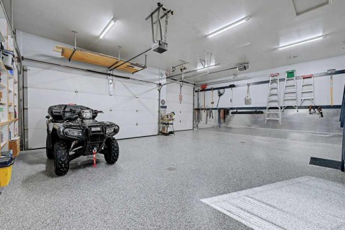 151 Arbour Vista Road Nw, Calgary, AB - Indoor Photo Showing Garage