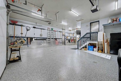 151 Arbour Vista Road Nw, Calgary, AB - Indoor Photo Showing Garage