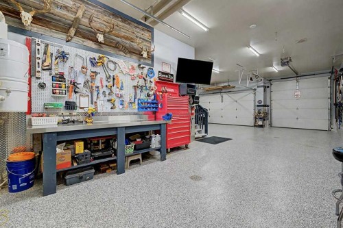 151 Arbour Vista Road Nw, Calgary, AB - Indoor Photo Showing Garage