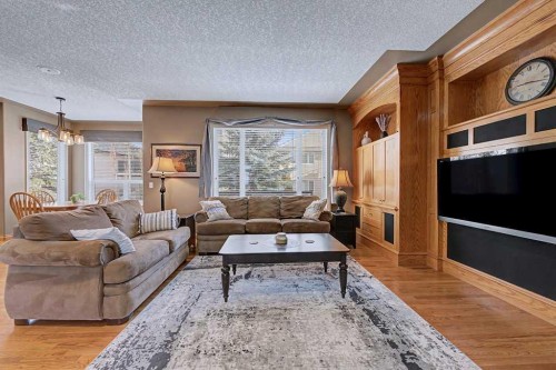 151 Arbour Vista Road Nw, Calgary, AB - Indoor Photo Showing Living Room