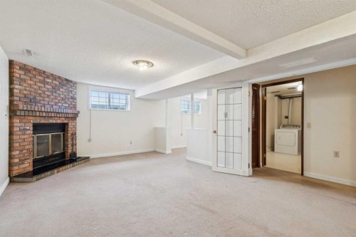 6820 4 Avenue Se, Calgary, AB - Indoor With Fireplace