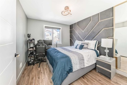 630 Rocky Ridge View Nw, Calgary, AB - Indoor Photo Showing Bedroom