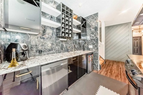 630 Rocky Ridge View Nw, Calgary, AB - Indoor Photo Showing Kitchen With Upgraded Kitchen