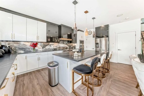 630 Rocky Ridge View Nw, Calgary, AB - Indoor Photo Showing Kitchen With Upgraded Kitchen