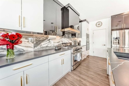 630 Rocky Ridge View Nw, Calgary, AB - Indoor Photo Showing Kitchen With Upgraded Kitchen